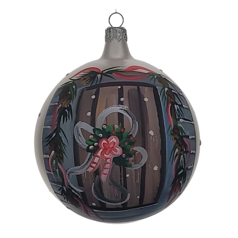 Round blown glass ornament painted matte white with a gingerbread man on a door handpainted 