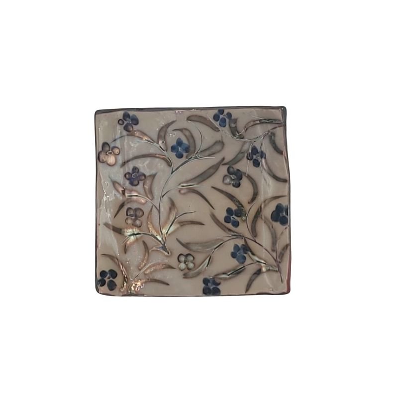 "Hand-painted trinket dish with allover blue floral pattern and iridescent hues, perfect for holding jewelry or small items"