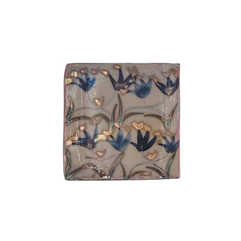 "Hand-painted trinket dish with abstract design in shimmering iridescent tones, perfect for holding jewelry or small items"