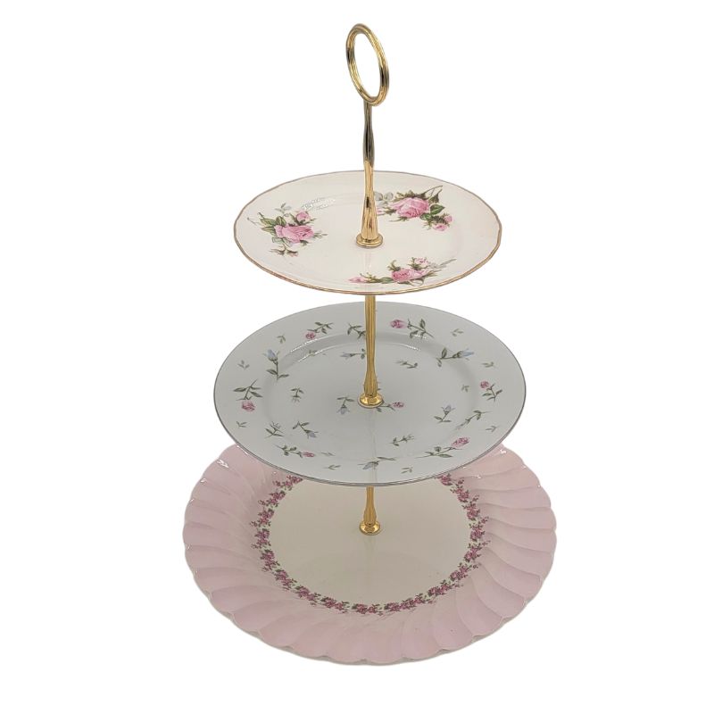 three tiered vintage plate server in pink with gold hardware