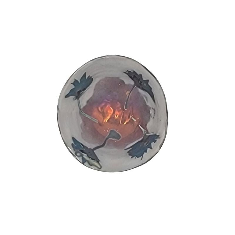 "Hand-painted iridescent bowl with large blue flowers, perfect for holding small items or as a decorative accent"