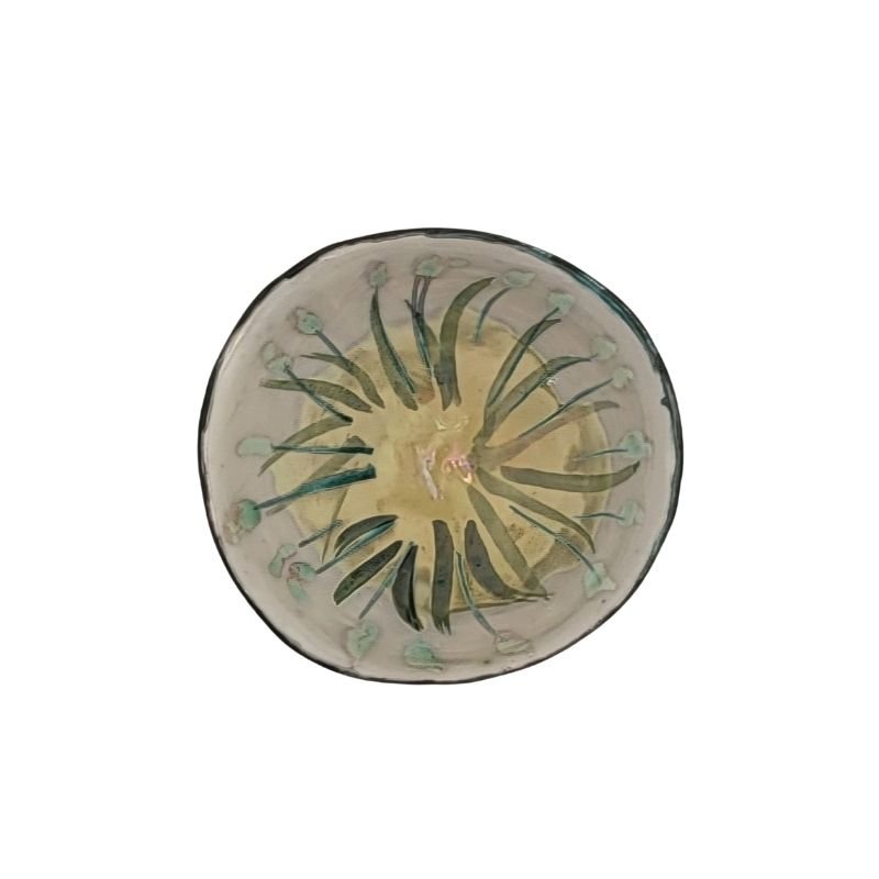 "Hand-painted iridescent bowl with wildflowers, perfect for holding small items or as a decorative accent"