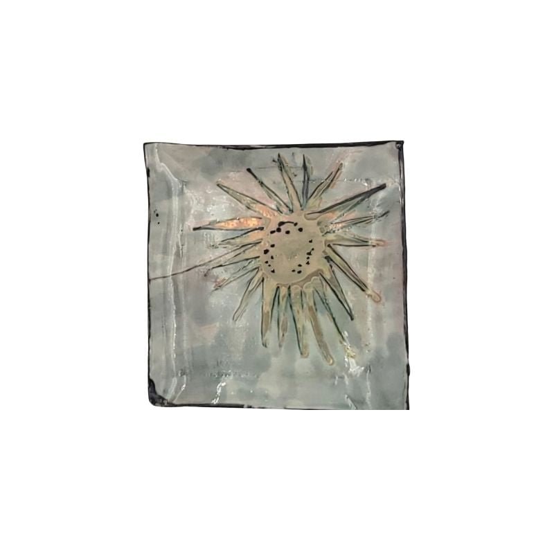 "Hand-painted ceramic trinket dish with iridescent sunburst design for jewelry and keys"
