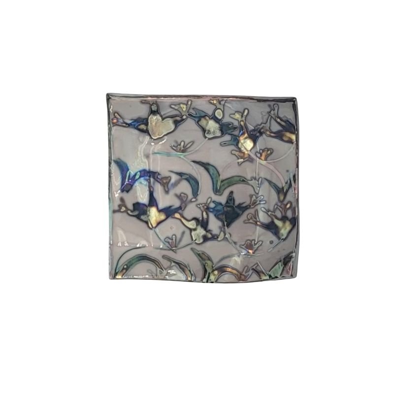 Hand-painted ceramic plate with abstract floral design and iridescent accents