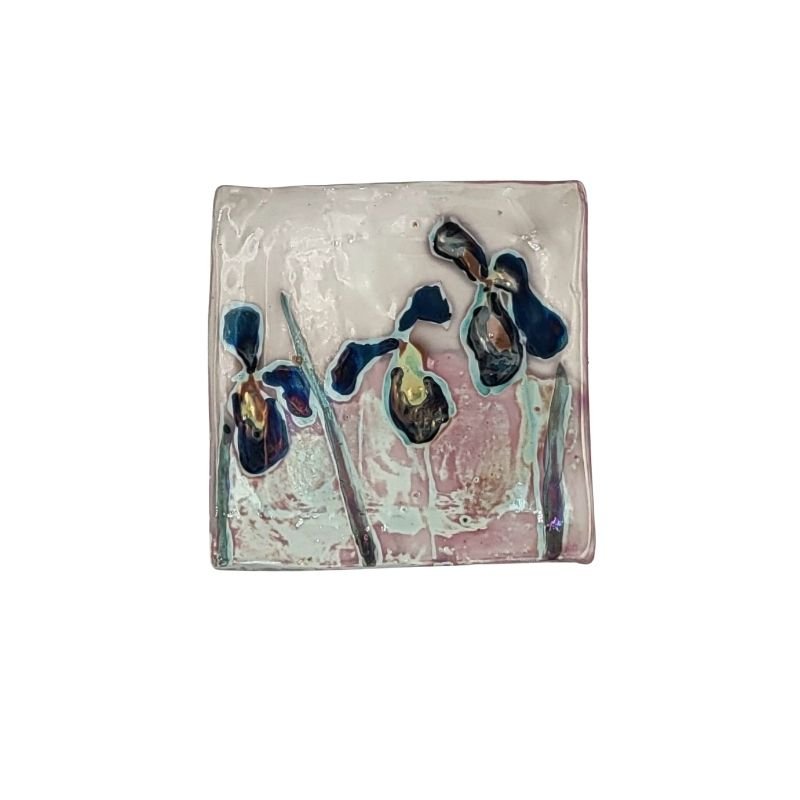 "Hand-painted trinket dish with deep blue irises on a cream iridescent background, perfect for holding jewelry or small items"