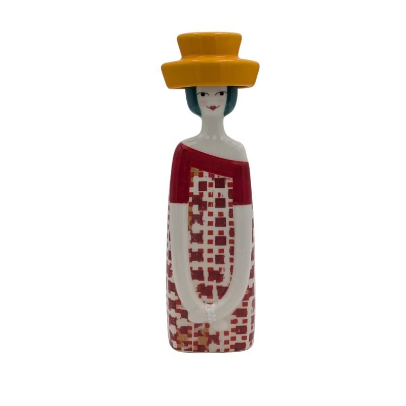Handcrafted Italian figurine of woman in orange hat and patterned dress, whimsical shelf or tabletop décor