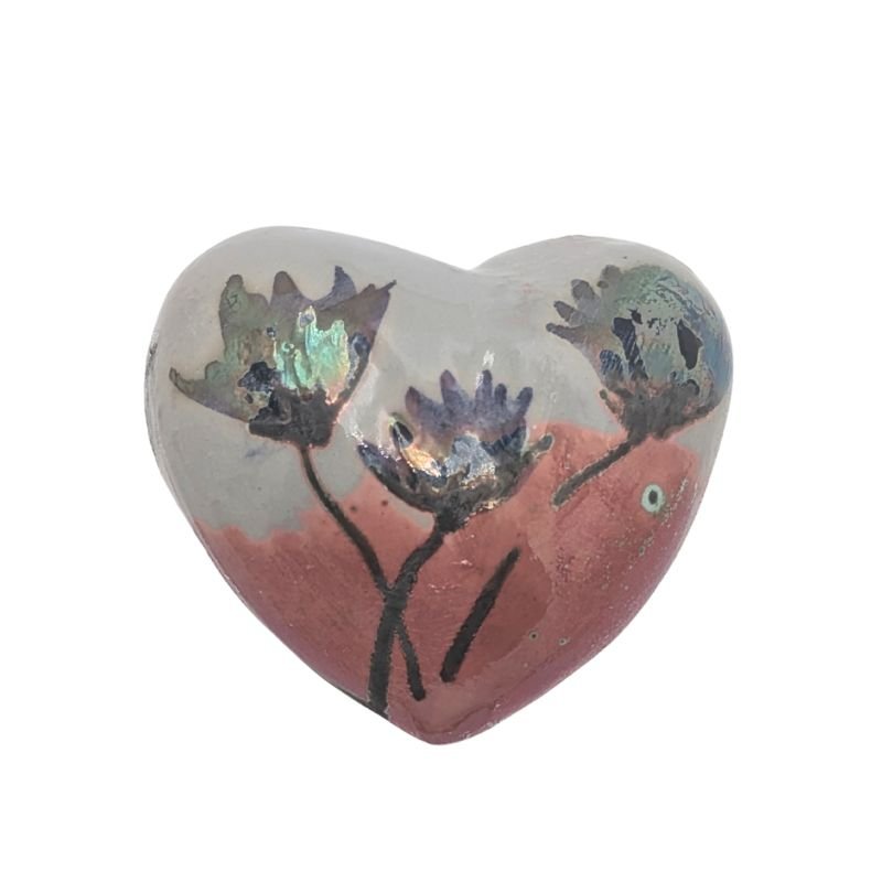 Ceramic heart with iridescent violet and gold floral design on a rose gold base by Paola Staccioli.