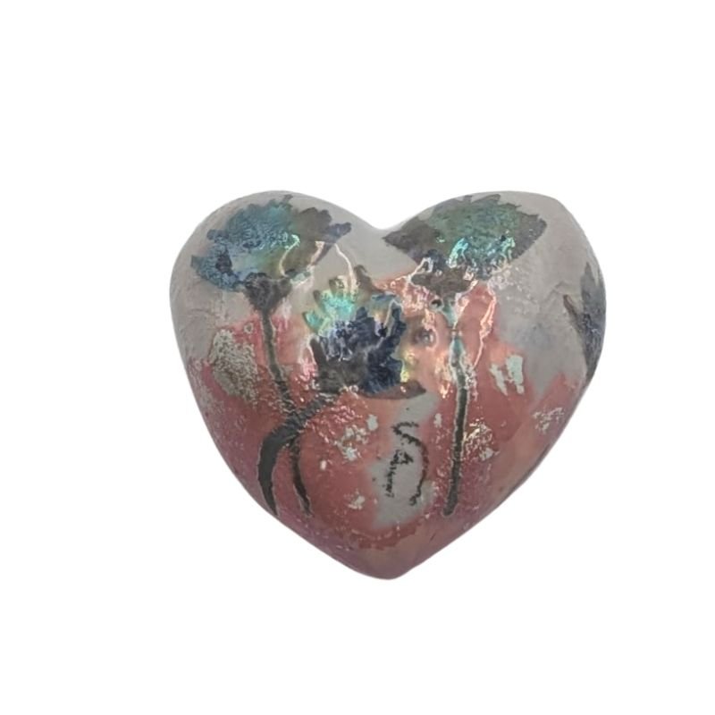 Ceramic heart with iridescent violet and gold floral design on a rose gold base by Paola Staccioli.