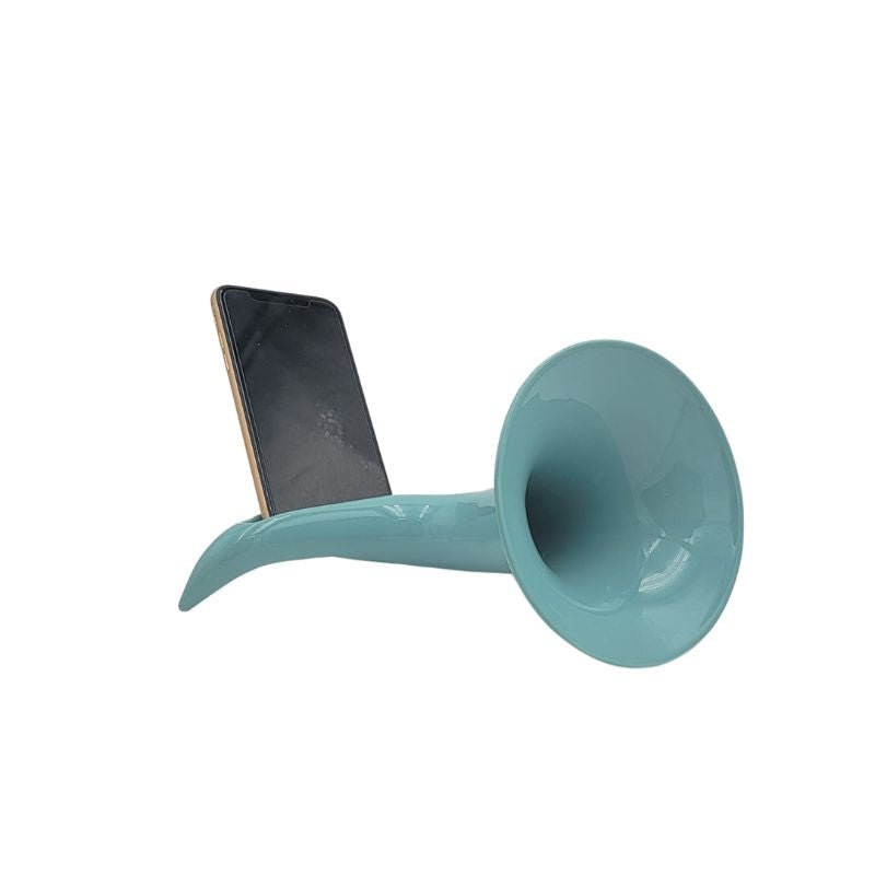 Ceramic turquoise amplifier that is shaped like an old fashioned gramaphone, compatible with smartphones.