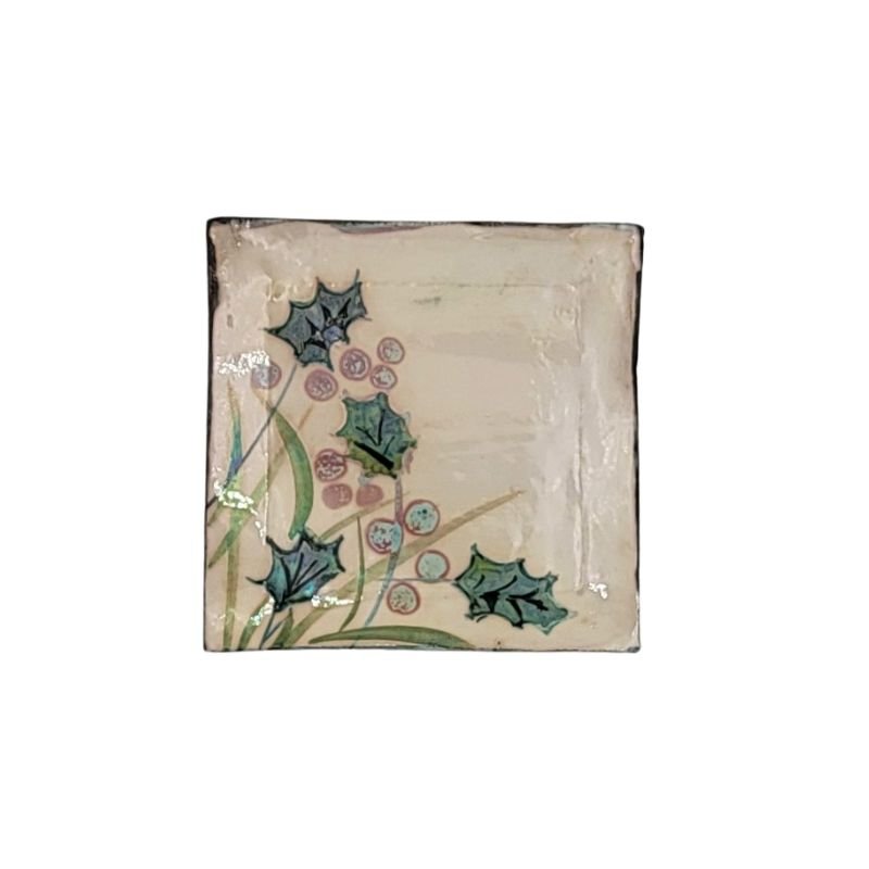 Square trinket plate with iridescent holly.