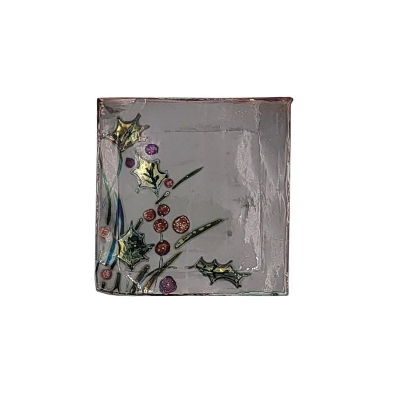 Square grey trinket dish painted with iridescent holly.