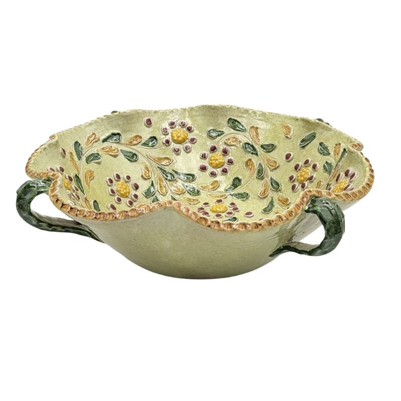 Large ceramic bowl in light yellow with burgundy, green and yellow flowers in the center of the bowl.