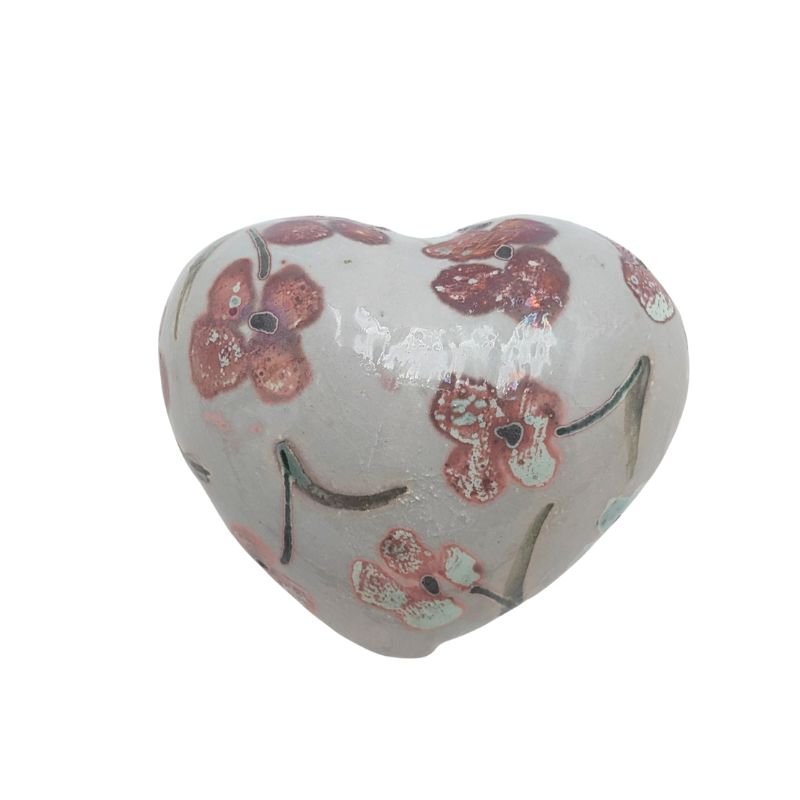 Ceramic heart with blush and coral floral design and iridescent glaze by Paola Staccioli.