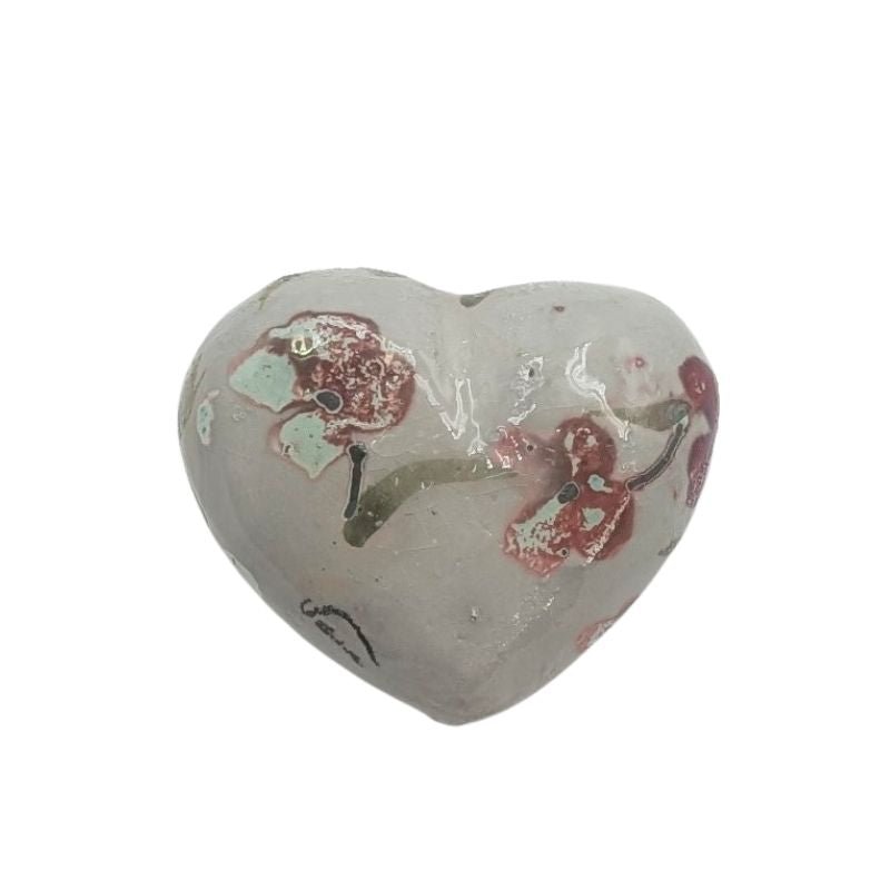 Ceramic heart with blush and coral floral design and iridescent glaze by Paola Staccioli.