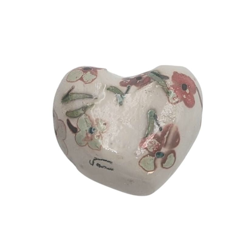 Ceramic heart with turq and deep rose floral design and iridescent glaze by Paola Staccioli.