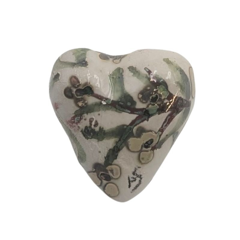 Ceramic heart with soft floral design in yellow and plum, finished with an iridescent glaze by Paola Staccioli.