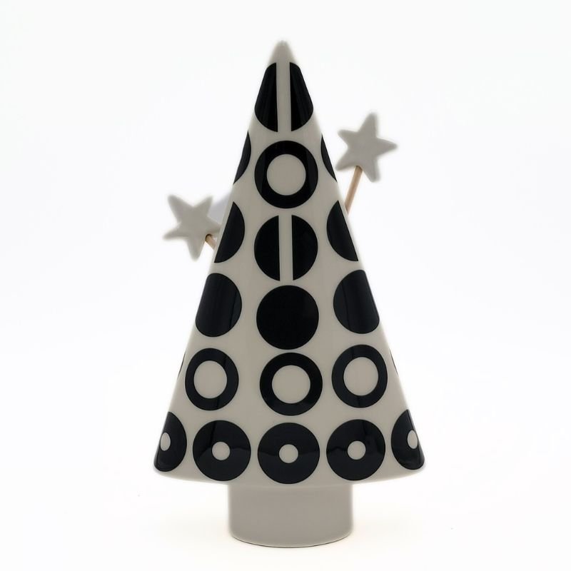 Christmas tree shaped ceramic diffuser with black and white geometric shapes and diffuser sticks with ceramic stars on top