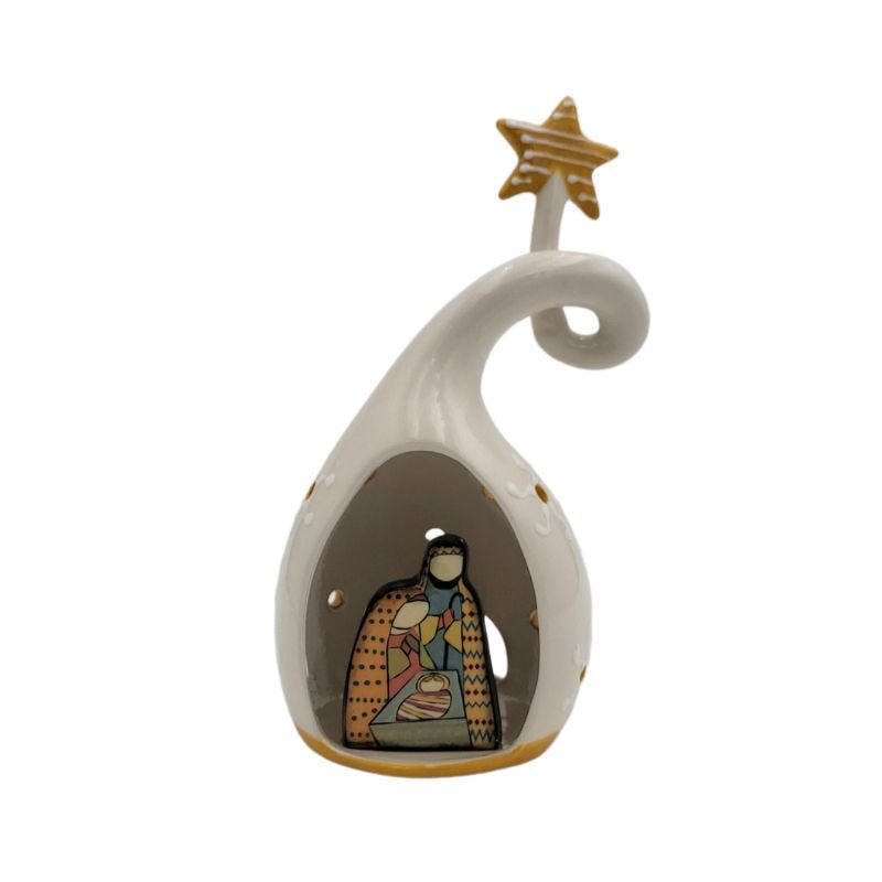 A multi colored Mary Joseph and baby Jesus sit inside a white ceramic gourd with a yellow star on top and white and yellow stars painted on the outside of the gourd.